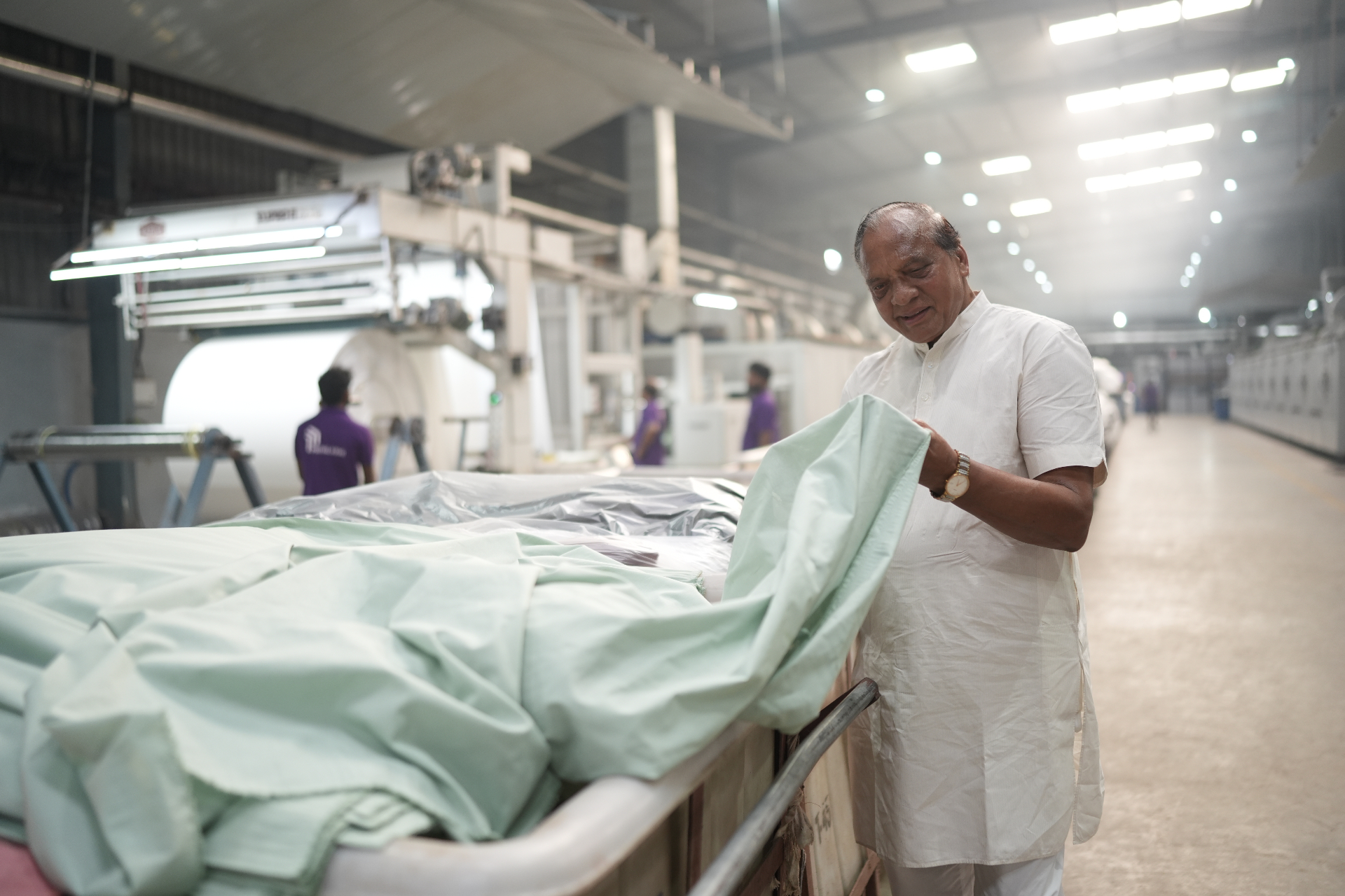 Inspecting fabric in the finishing hall